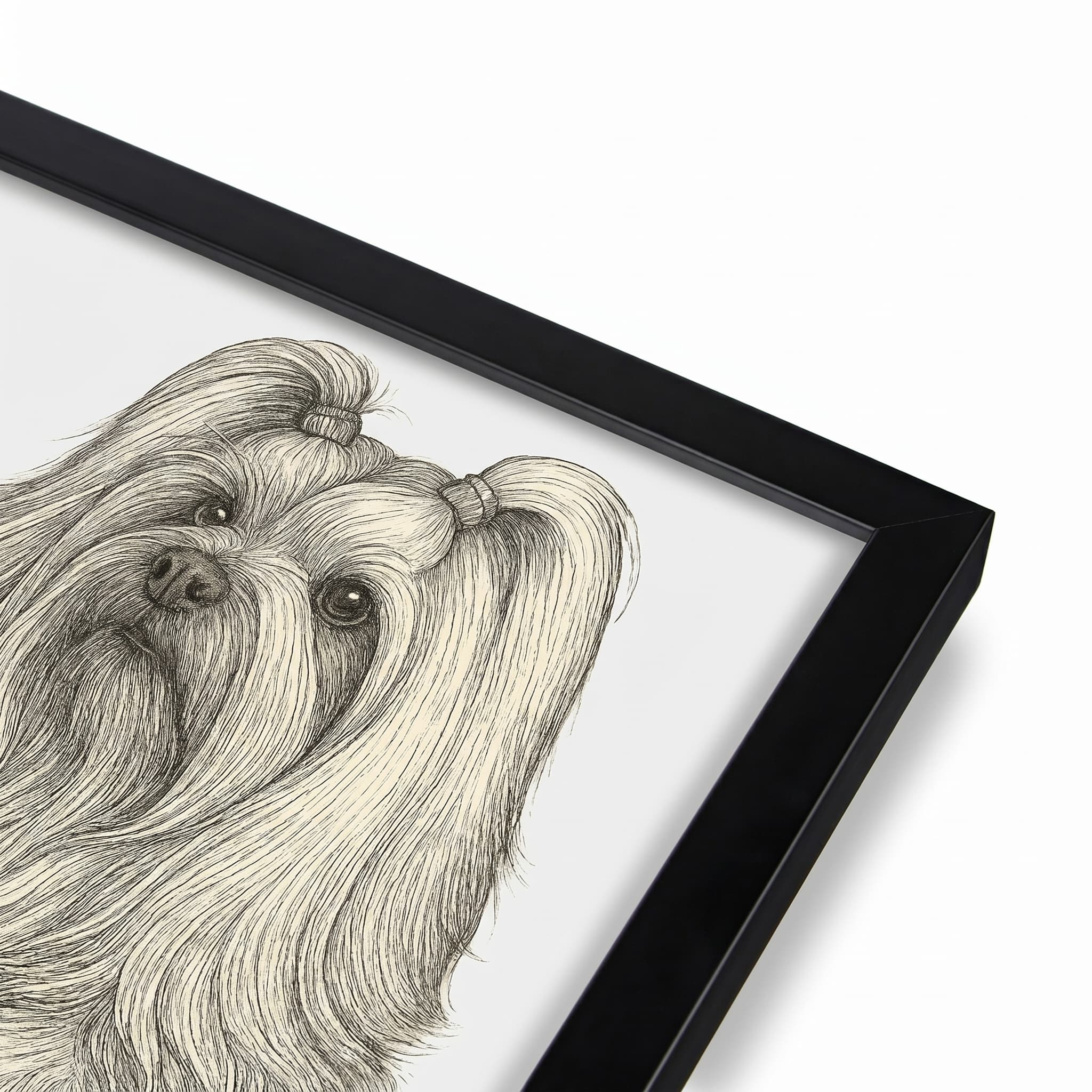Closeup of a classic black frame corner with the print mounted edge to edge, no mat.