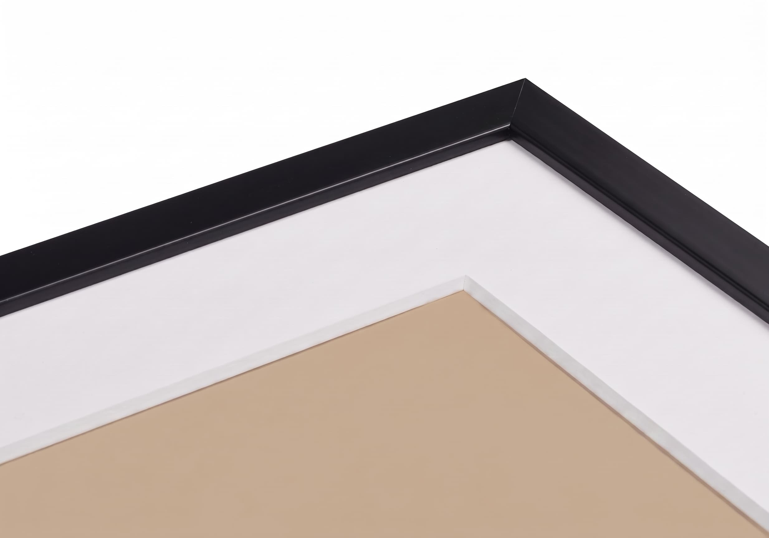Classic framed print photographed at an angle, showing the slim frame profile.
